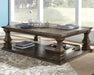 Johnelle Coffee Table - Dinettes Plus Furniture